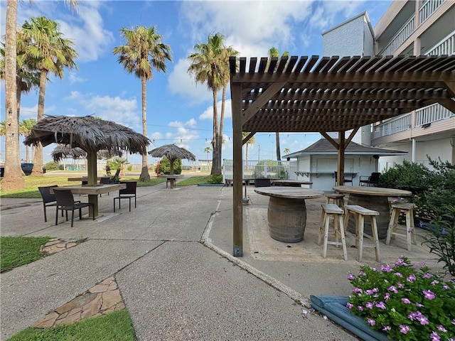 3938 Surfside Unit 3233, Corpus Christi, TX 78402 - view of patio / terrace with a pergola