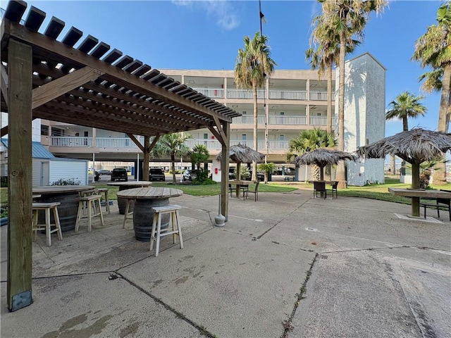 3938 Surfside Unit 3233, Corpus Christi, TX 78402 - view of patio with a pergola