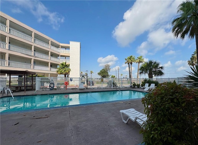 3938 Surfside Unit 3233, Corpus Christi, TX 78402 - community pool with a patio area
