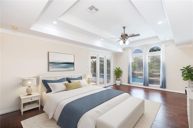4 E Bar Le Doc Dr, Corpus Christi, TX 78414 - bedroom featuring a raised ceiling, access to exterior, crown molding, dark wood-type flooring, and french doors