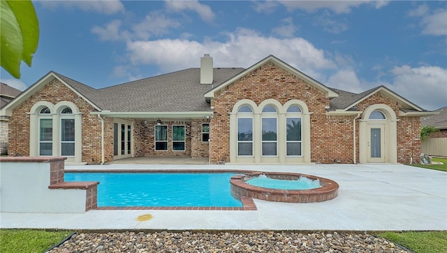4 E Bar Le Doc Dr, Corpus Christi, TX 78414 - view of pool featuring a patio area and a pool with connected hot tub