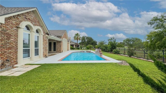 4 E Bar Le Doc Dr, Corpus Christi, TX 78414 - view of pool with french doors, a patio area, and a pool with connected hot tub