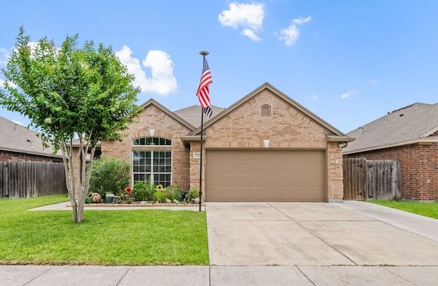 7722 Lands End Dr, Corpus Christi, TX 78414 - view of front of house with a garage, brick siding, and driveway
