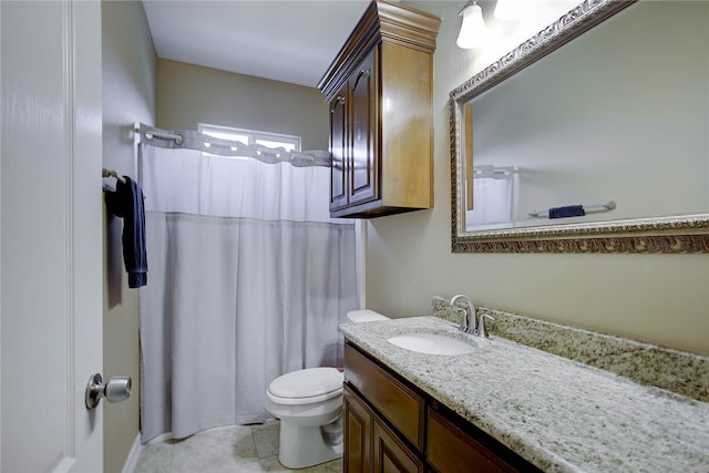 bathroom featuring walk in shower, tile patterned flooring, vanity, and toilet