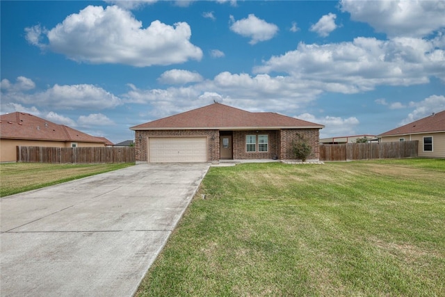 ranch-style house featuring a garage and a front yard