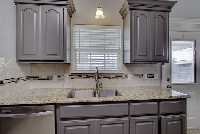 kitchen with gray cabinets, stainless steel dishwasher, and sink