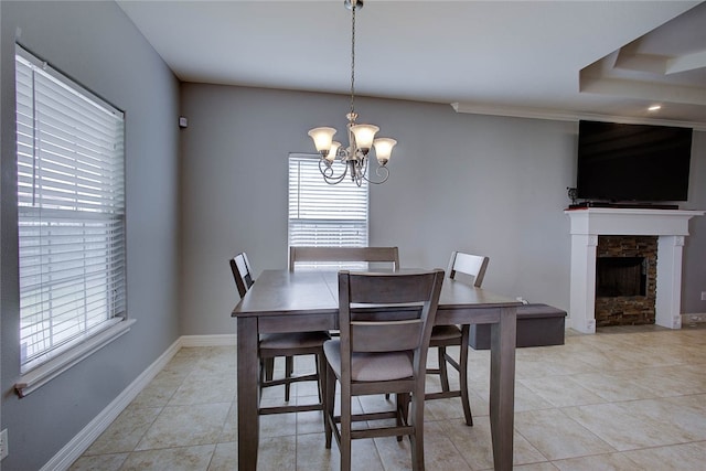 tiled dining area with a chandelier