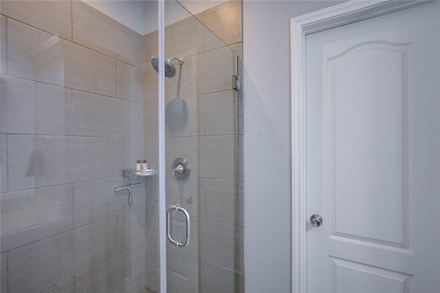 bathroom featuring an enclosed shower