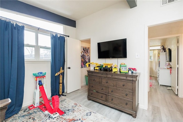 bedroom with light wood-type flooring