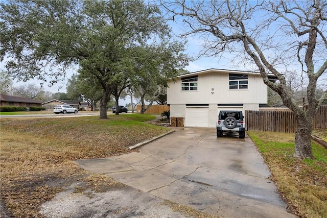 view of side of property with a garage