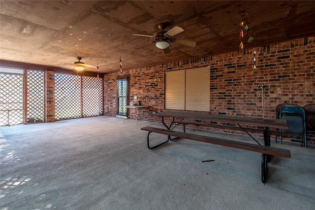 view of patio featuring ceiling fan