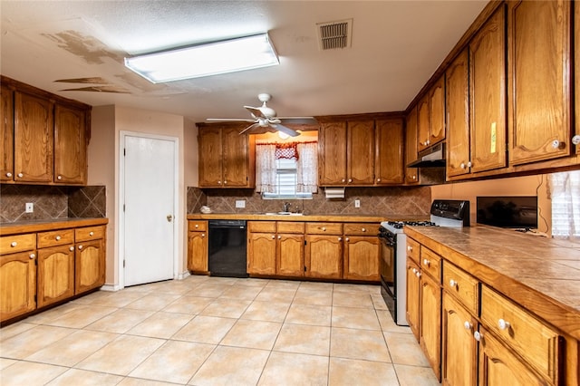 kitchen featuring range with gas stovetop, sink, dishwasher, a skylight, and ceiling fan