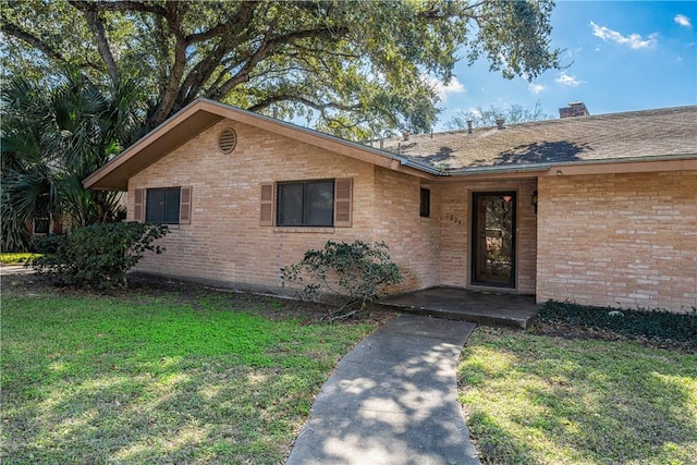 view of front of house with a front yard