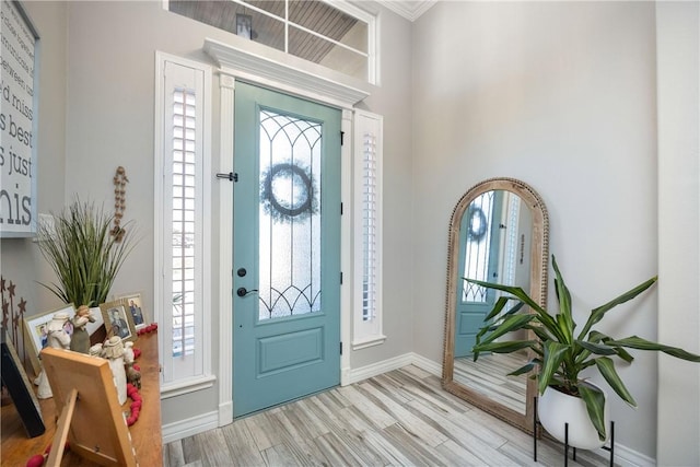 6401 Kobe Dr, Corpus Christi, TX 78414 - foyer featuring wood finished floors and crown molding