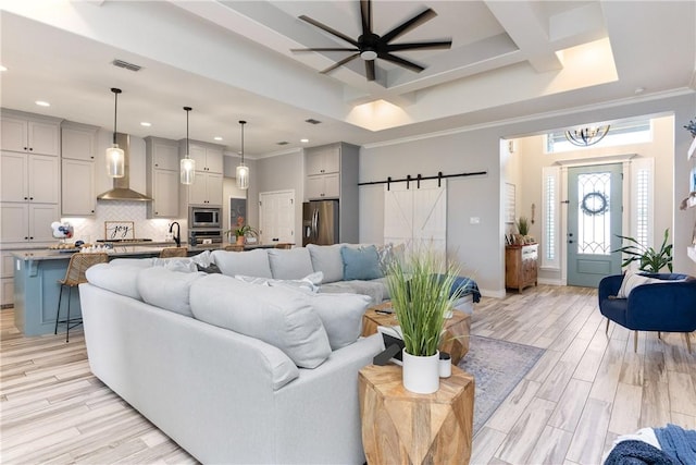 6401 Kobe Dr, Corpus Christi, TX 78414 - living room featuring recessed lighting, a barn door, coffered ceiling, ceiling fan, and light wood finished floors