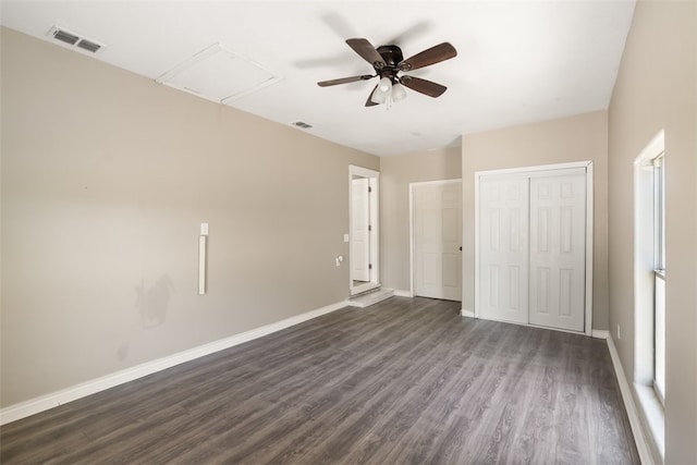 4513 Green Grove Dr, Corpus Christi, TX 78415 - unfurnished bedroom with attic access, dark wood-style floors, a closet, and a ceiling fan