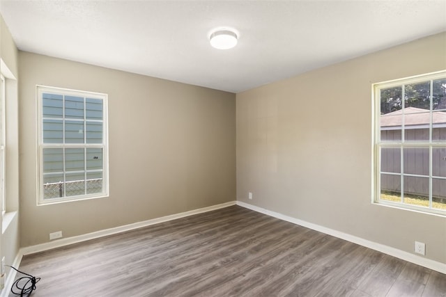 4513 Green Grove Dr, Corpus Christi, TX 78415 - unfurnished room with wood finished floors and baseboards