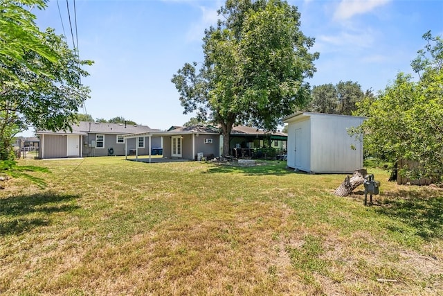 4513 Green Grove Dr, Corpus Christi, TX 78415 - view of grassy yard featuring a shed