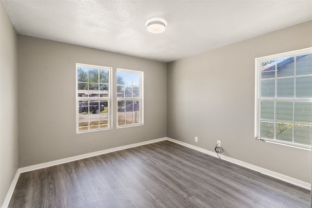 4513 Green Grove Dr, Corpus Christi, TX 78415 - spare room with dark wood-style floors