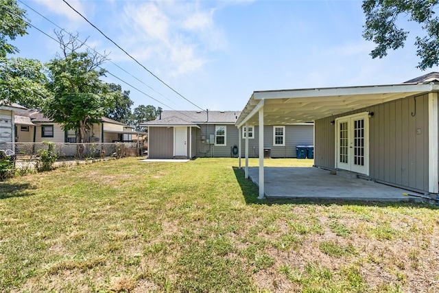 4513 Green Grove Dr, Corpus Christi, TX 78415 - back of house with french doors and a patio