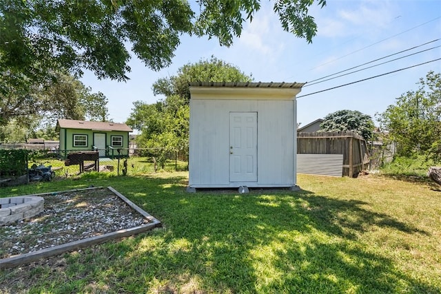 4513 Green Grove Dr, Corpus Christi, TX 78415 - view of shed with a fenced backyard