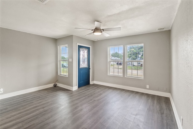 4513 Green Grove Dr, Corpus Christi, TX 78415 - foyer with ceiling fan, dark wood-type flooring, and a textured ceiling