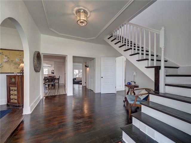 foyer featuring dark wood-type flooring