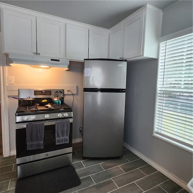 kitchen featuring white cabinets and appliances with stainless steel finishes