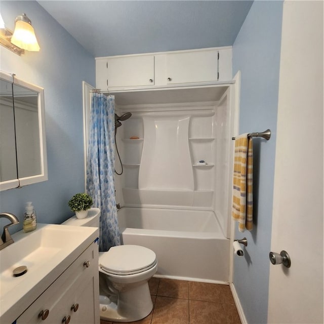 full bathroom featuring vanity, shower / bath combo with shower curtain, tile patterned flooring, and toilet