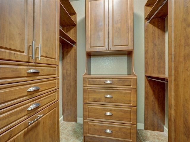 walk in closet featuring tile patterned floors