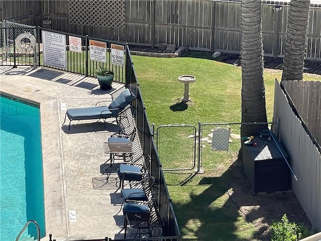 520 S Chaparral St Unit 402, Corpus Christi, TX 78401 - view of yard with a community pool