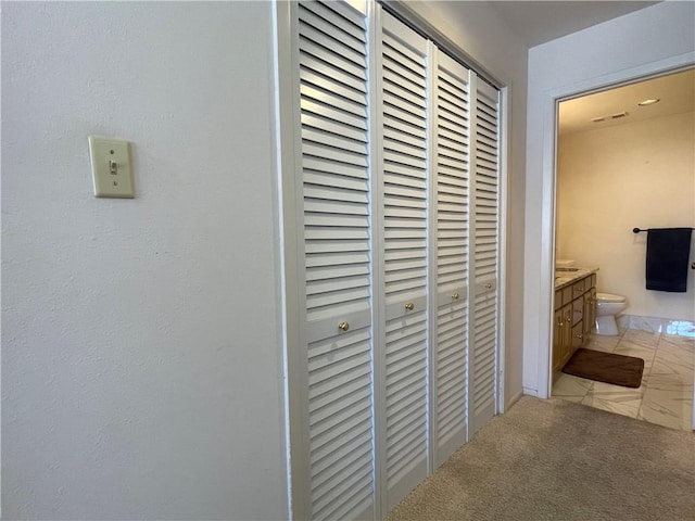520 S Chaparral St Unit 402, Corpus Christi, TX 78401 - hallway with light carpet
