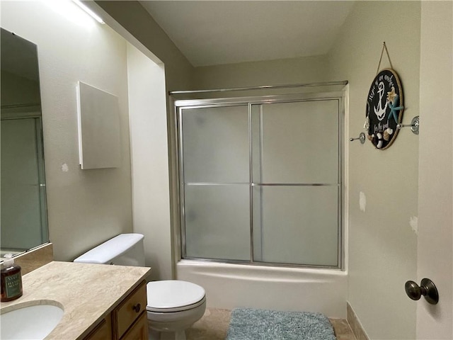520 S Chaparral St Unit 402, Corpus Christi, TX 78401 - bathroom featuring vanity, toilet, and shower / bath combination with glass door