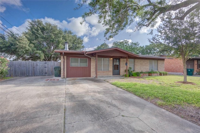 5802 Riley Dr, Corpus Christi, TX 78412 - ranch-style home with brick siding and concrete driveway