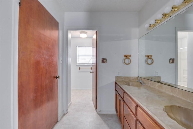 5802 Riley Dr, Corpus Christi, TX 78412 - full bathroom featuring double vanity and tile patterned flooring