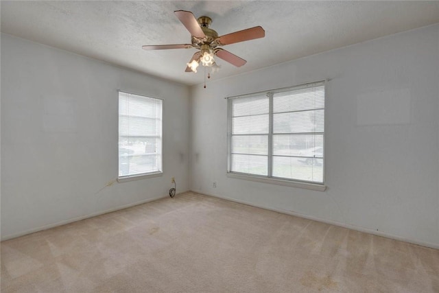 5802 Riley Dr, Corpus Christi, TX 78412 - empty room with light carpet and a ceiling fan