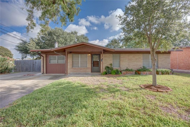 5802 Riley Dr, Corpus Christi, TX 78412 - ranch-style home with brick siding and driveway