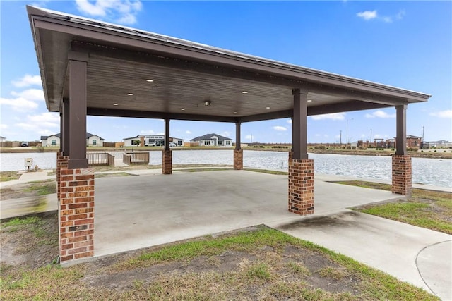 1929 Magnolia Falls Dr, Corpus Christi, TX 78415 - view of patio / terrace featuring a water view