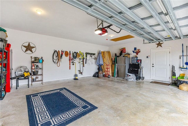 garage featuring a garage door opener