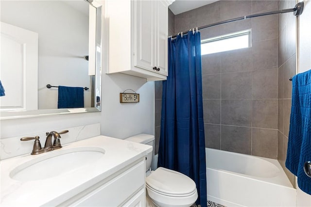 full bathroom with vanity, toilet, and shower / bath combo