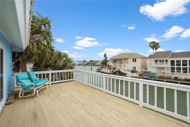 deck featuring a water view