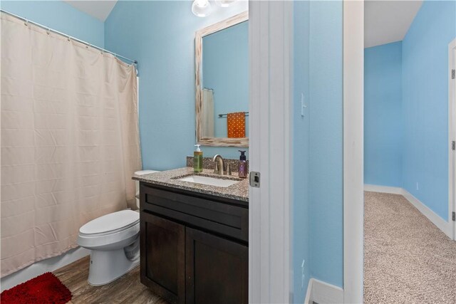 7338 Allman Dr, Corpus Christi, TX 78414 - bathroom featuring toilet and vanity