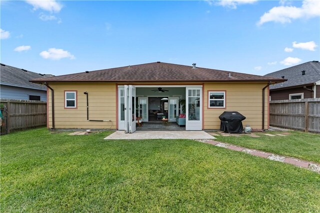 7338 Allman Dr, Corpus Christi, TX 78414 - rear view of property featuring a fenced backyard, ceiling fan, and a patio