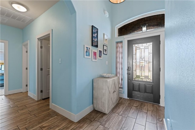 7338 Allman Dr, Corpus Christi, TX 78414 - entrance foyer with wood finished floors and arched walkways