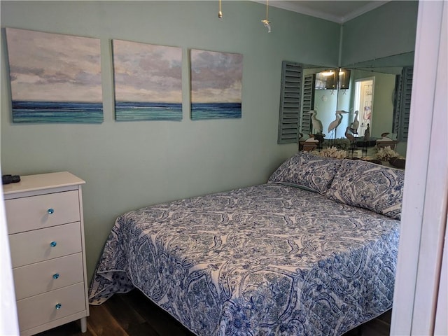 3938 Surfside Blvd Unit 2236, Corpus Christi, TX 78402 - bedroom with dark wood-type flooring and crown molding