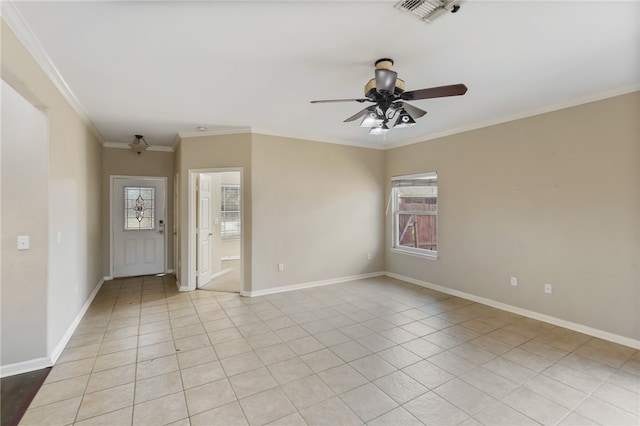 empty room featuring ceiling fan, light tile patterned floors, and ornamental molding