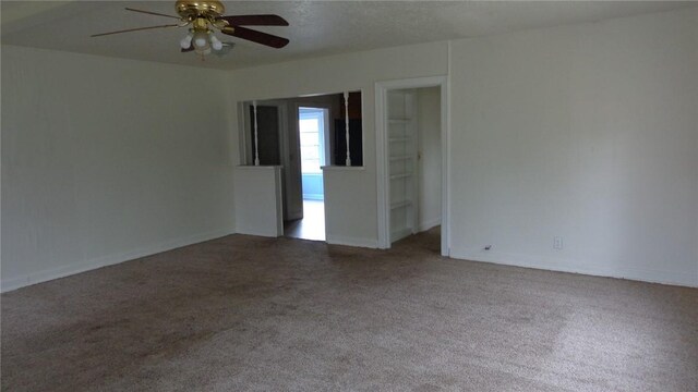 810 S 10th St, Kingsville, TX 78363 - carpeted empty room featuring ceiling fan