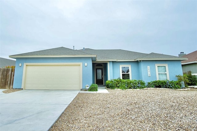 single story home featuring a garage