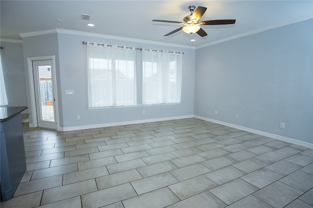 empty room featuring ornamental molding, light tile patterned floors, and ceiling fan