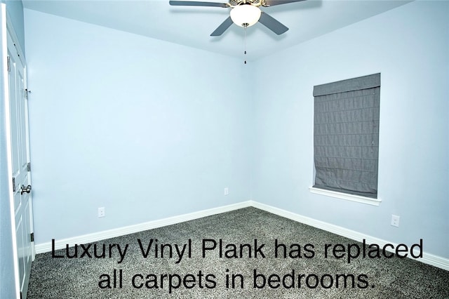 empty room featuring ceiling fan and carpet floors